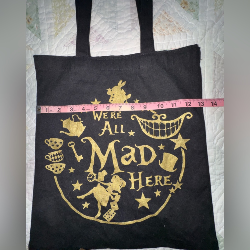 💥SALE ‘We’re All Mad Here” Tote Bag | Alice in Wonderland Quote | Black & Gold - Picture 5 of 7